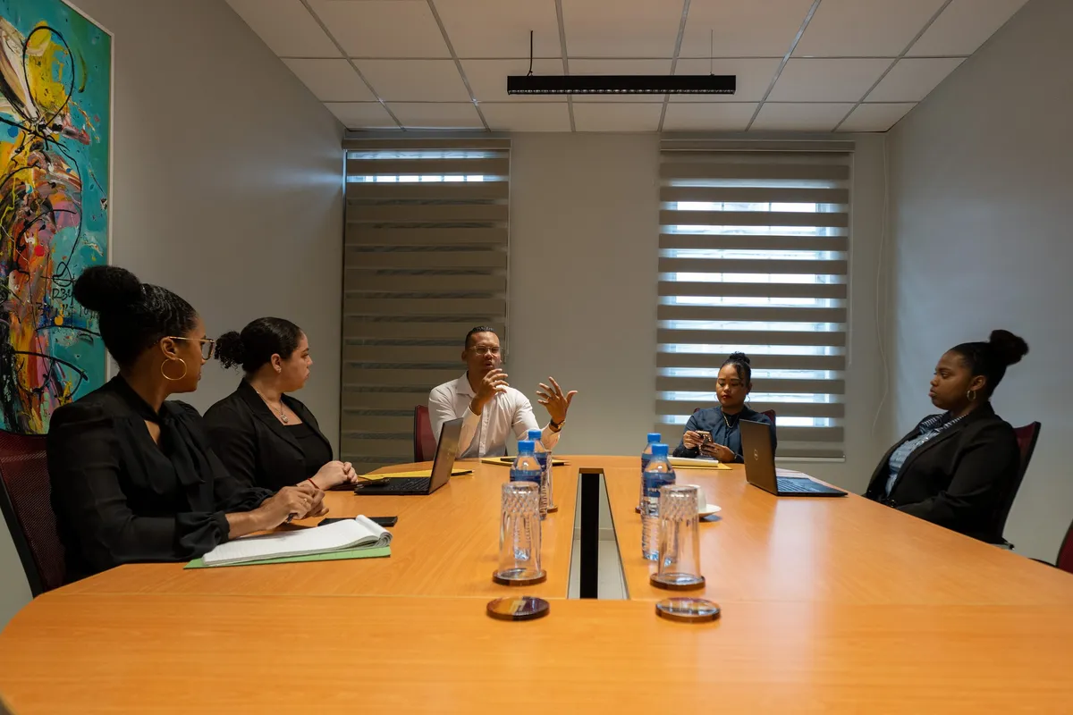 Employment agreement discussion in a boardroom setting